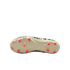 A bottom view of an off-white soccer cleat with bright orange studs and a black-and-white leopard print upper, centered against a solid black background.