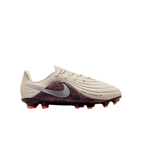 Profile view of a cream-colored Nike soccer cleat against a solid black background. The shoe features a purple leopard-print side panel, a metallic silver swoosh, and bright orange studs. The text "NIKE UNITED 003" is printed near the toe.