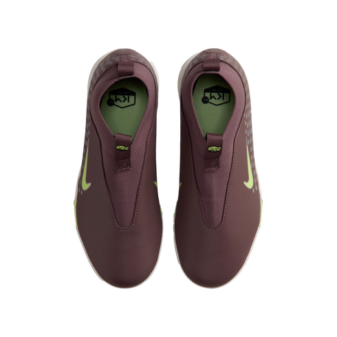 Top-down view of a pair of maroon slip-on Nike shoes featuring lime green swooshes and KM branding on the insoles.
