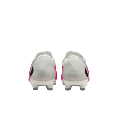 Rear view of white and pink soccer cleats with translucent heel counters and black accents on a white background.
