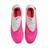 Top-down view of pink and white Nike Phantom soccer cleats on a white background.