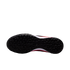 Bottom view of a black Nike sneaker outsole with a hexagonal tread pattern, featuring white and pink midsole accents on a white background.