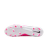 The white and pink soleplate of a Nike soccer cleat, showing bright pink studs and a black swoosh logo on the heel.