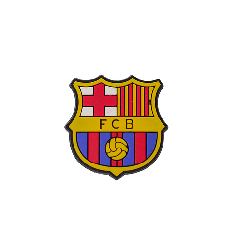 A crest-shaped Soccer Croc Charm featuring the FC Barcelona logo with its traditional red, blue, and yellow colors.