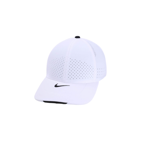 A white Nike performance baseball cap featuring laser-cut ventilation holes, a black swoosh logo on the front, and a black top button.