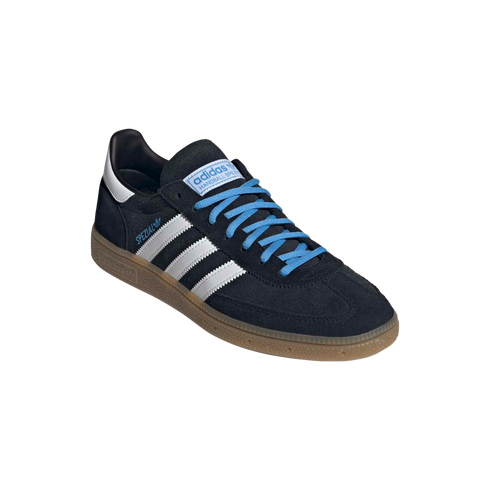 Adidas Handball Spezial sneaker featuring a navy suede upper, white serrated stripes, bright blue laces, and a classic gum rubber sole.