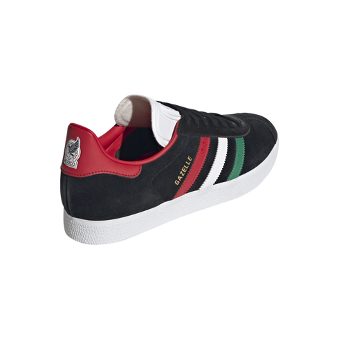 Black Adidas Gazelle sneaker with red, white, and green stripes. Features a red heel tab with a white Mexico logo and a white textured sole.