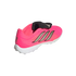 Three-quarter rear view of a bright pink Adidas soccer shoe with silver stripes, a black fold-over tongue, and a white studded sole against a plain white background.