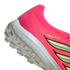 Close-up of a pink Adidas Predator shoe heel with a white Lightstrike midsole and textured outsole.