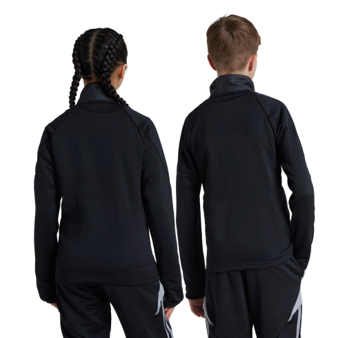 Back view of two children, a girl with braided hair and a boy, wearing matching black athletic tracksuits against a white background.