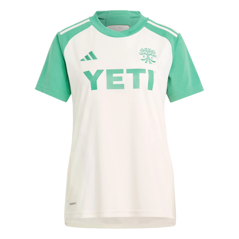 White Austin FC soccer jersey with light green sleeves and collar, featuring a large green Yeti sponsor logo on the chest and Adidas branding.