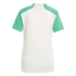 Back view of a white sports shirt featuring bright green short sleeves and shoulder panels on a solid black background. Small text is printed on the back neck.