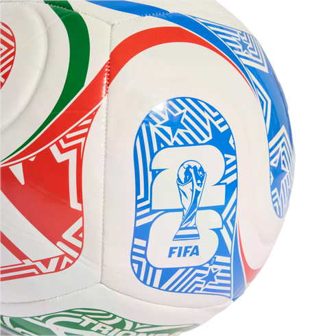 Close-up of a white soccer ball featuring red, green, and blue geometric patterns and the FIFA World Cup 26 logo with a trophy icon.