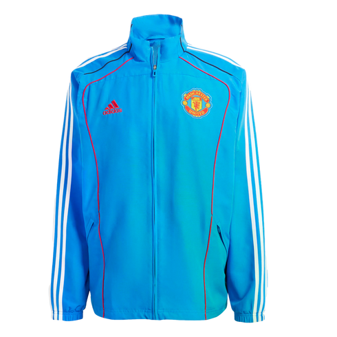 Blue Adidas Manchester United zip-up track jacket with the club crest, red trim, and white three-stripe details on the sleeves.