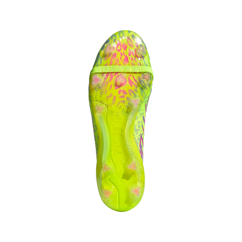 Vibrant neon yellow soleplate of an Adidas Predator soccer cleat with pink patterns, clear studs, and embossed "PREDATOR" text.