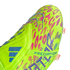 Close-up of a lime green Adidas Predator soccer cleat featuring vibrant pink and blue patterns and a midfoot strap.