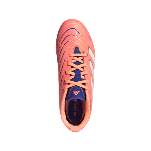 Top-down view of a pink Adidas Predator soccer cleat with navy blue tongue and laces, featuring white side stripes, on a black background.