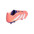 Rear side view of a peach Adidas Predator soccer cleat with white stripes and purple accents on a black background.
