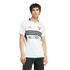 A man with dark curly hair wearing a white D.C. United soccer jersey with three black horizontal stripes across the chest, posing against a solid black background.