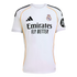 A white Real Madrid 2024/25 home jersey featuring the club crest, Adidas and Emirates logos, an HP sleeve sponsor, and orange trim along the sides.