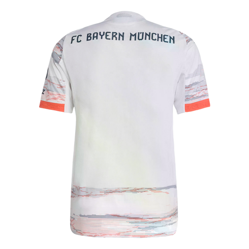 Back view of a white FC Bayern München jersey with dark blue text and orange and grey linear patterned accents on the lower back and sleeves.