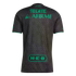 Back view of a gray soccer jersey with a black hexagonal pattern and bright green sponsor logos (Tecate, Afirme, and H-E-B) on the center and bottom.