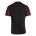Back view of a black short-sleeved jersey featuring red lightning-like patterns on the shoulders and sleeves.