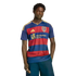 A young man models a Real Salt Lake soccer jersey with red and blue stripes and yellow accents against a black background.