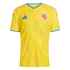 Yellow Colombia national team soccer jersey by Adidas, featuring blue and red trim and a subtle pattern across the front.