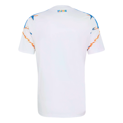 Back view of a white short-sleeved jersey with blue and orange graphic patterns on the shoulders and a small, colorful "SIN FRONTERAS" logo near the neckline.