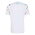 Back view of a white short-sleeved jersey with blue and orange graphic patterns on the shoulders and a small, colorful "SIN FRONTERAS" logo near the neckline.