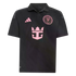 A black Inter Miami CF soccer jersey with pink accents, featuring the Adidas logo, team crest, and Royal Caribbean sponsor logo. It has a black polo collar.