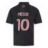 Back view of a black soccer jersey with pink text reading "MESSI" and a large number 10. The words "FREEDOM TO DREAM" are printed in pink near the collar.