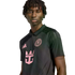 Young man with dreadlocks in a black and pink Inter Miami CF jersey featuring the Adidas, team crest, and Royal Caribbean logos, against a black background.