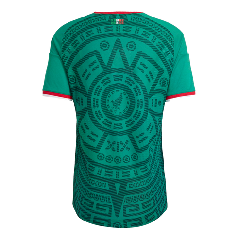 Back of a green Mexico national team soccer jersey featuring a large, intricate Aztec-inspired tonal pattern and red and white trim on the collar and sleeves.