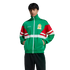 A man in a green, red, and white Adidas track jacket with the Mexico national team crest poses against a black background.
