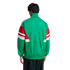 Back view of a person wearing a green track jacket with red and white color-blocked sleeves and white shoulder stripes, set against a black background.