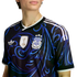 Person wearing a black Argentina soccer jersey with blue swirls, a 2022 FIFA World Champions patch, AFA crest with three stars, and white Adidas shoulder stripes.