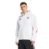 A man wearing a white FC Bayern Munich zip-up hoodie with a red Adidas logo and black track pants.