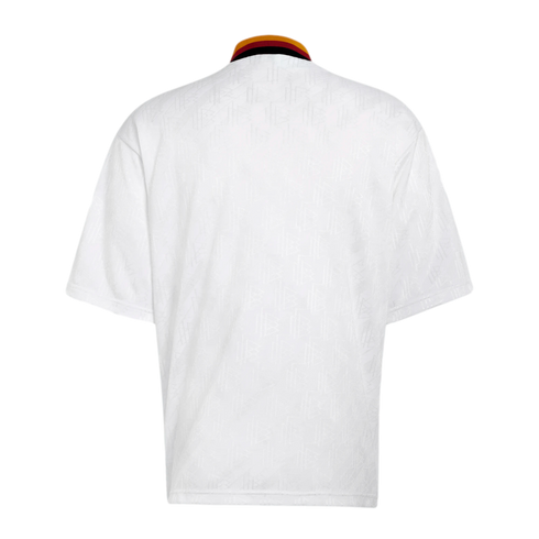 Back view of a white short-sleeve jersey featuring a subtle tonal pattern and a ribbed collar with black, red, and yellow stripes.