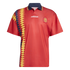 Adidas Spain red soccer jersey with a navy polo collar and a yellow and navy geometric pattern on the right side. Features the Spain national team crest on the chest.