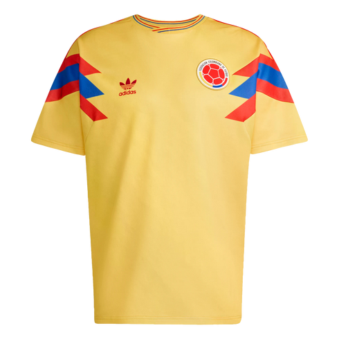 Yellow Adidas Colombia national soccer jersey featuring red and blue geometric shoulder patterns, the Adidas Trefoil logo, and the Colombian Football Federation crest.