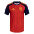 Red Spain national team soccer jersey with navy blue sleeves and collar. Features vertical stripes, a yellow Adidas logo, and the national crest.