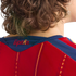 Close-up of the back of a person with curly hair wearing a red Spanish football jersey with "España" scripted on the blue neckline.