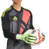 Goalkeeper in a black and red patterned Adidas jersey holds a soccer ball with lime green gloves against a black background.
