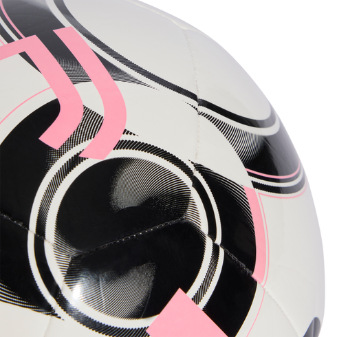 Close-up view of a white Juventus soccer ball featuring black and pink graphic designs and the stylized "J" logo.