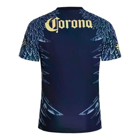 Back of a navy blue soccer jersey with light blue feather patterns on the sleeves and sides. A cream-colored Corona logo is printed across the upper back.