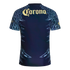Back of a navy blue soccer jersey with light blue feather patterns on the sleeves and sides. A cream-colored Corona logo is printed across the upper back.