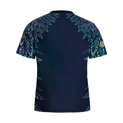 The back of a navy blue athletic shirt featuring ornate light blue feather-like patterns on the shoulders and sides, with gold sleeve logos, against a black background.