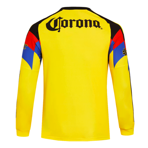 Back view of a yellow long-sleeved jersey with a black Corona logo and black, red, and blue geometric patterns on the shoulders and upper sleeves.